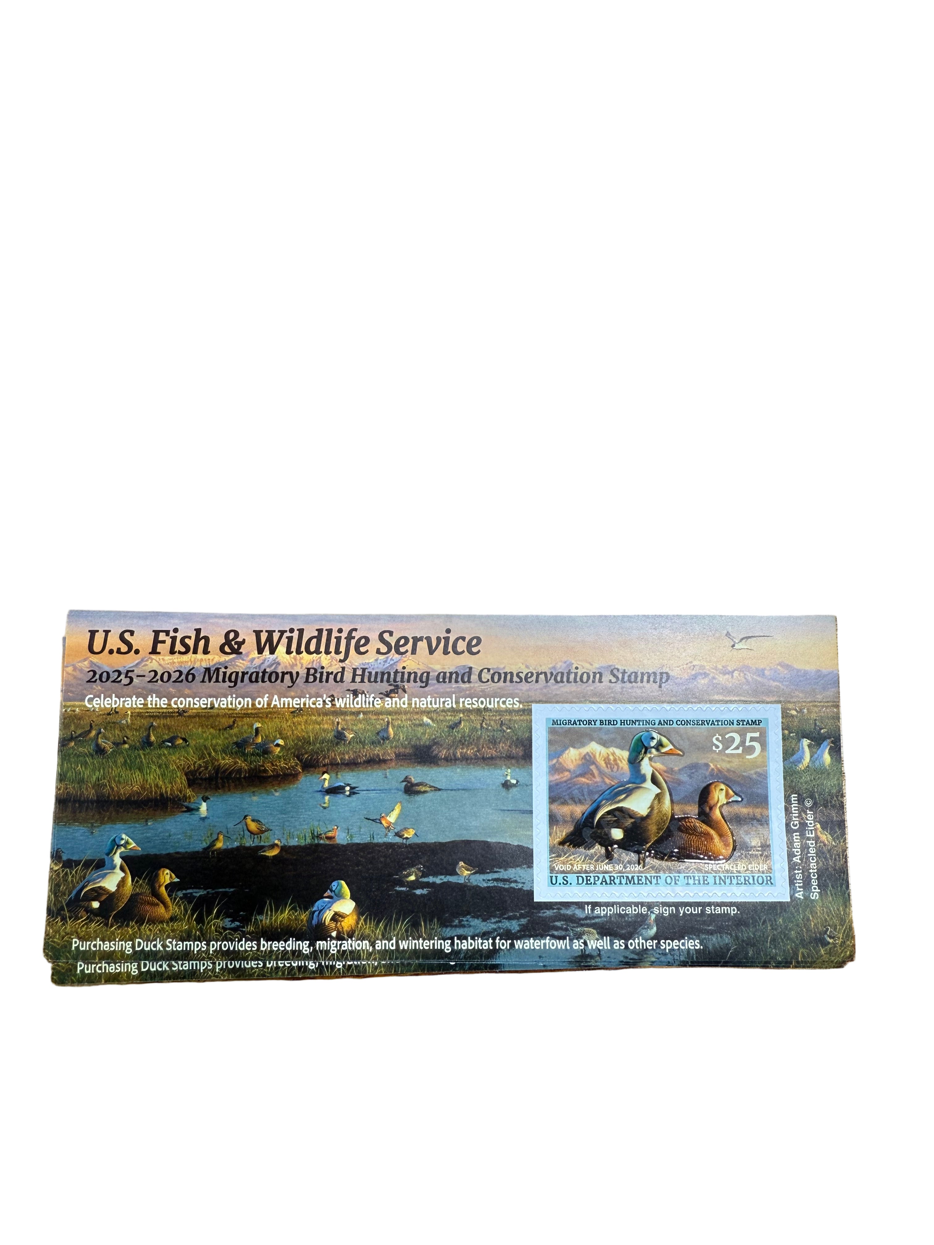 U.S. Fish & Wildlife Service stamp on a wooden surface