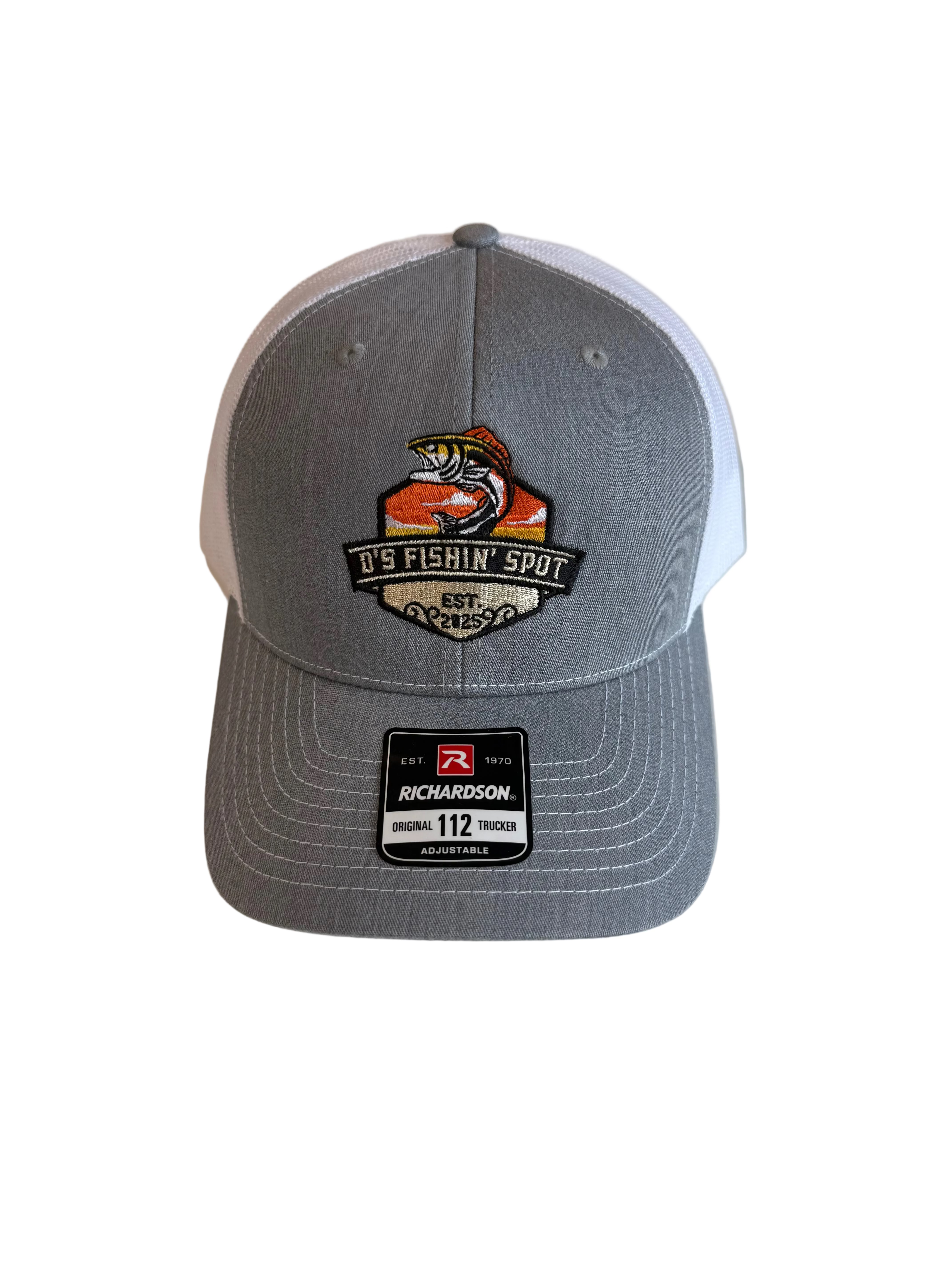 Gray cap with a logo and brand label on a white surface